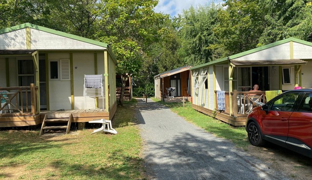 Chalet 'Camping Les Pialades - Club 5' with Shared Pool, Private Terrace and Private Garden