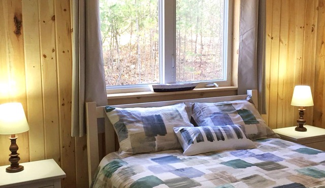 Chalet directly on the lake, central storage, incl. access to private island