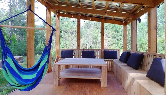 Chalet en bois rond du Caribou | Spa et Riviere