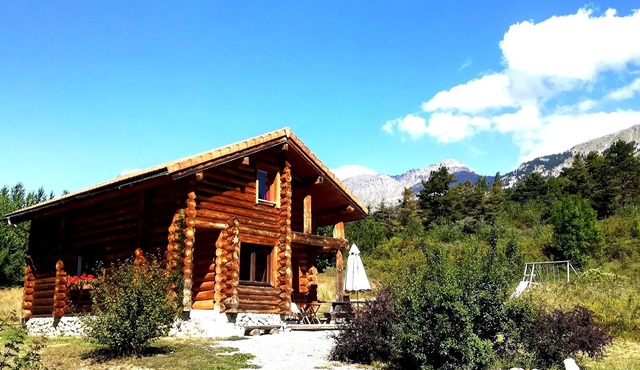 Chalet in logs of raw wood in south's alps . quiet, space and comfort