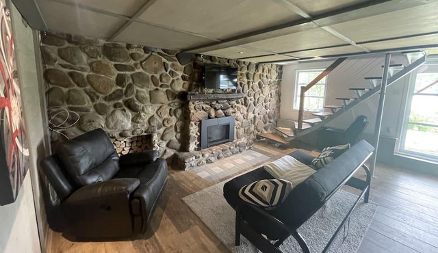 Chalet intime & chaleureux bord de l’eau