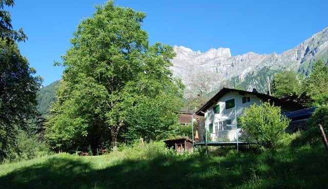 Chalet on the edge of the forest with a view of the waterfall right next door