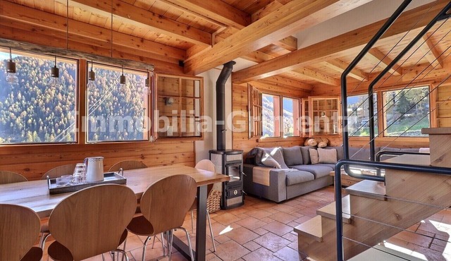 Chalet ski in - ski out on 3 levels for 8 people, living room with wood-burner, kitchen area with di