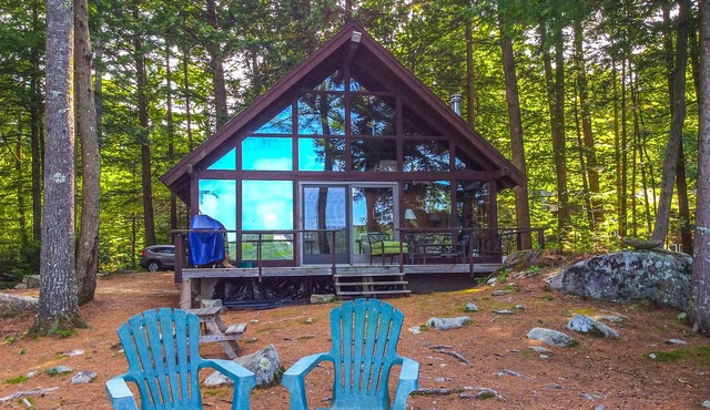 Chalet-style lakefront home with private dock, beach, kayak, canoe & epic view