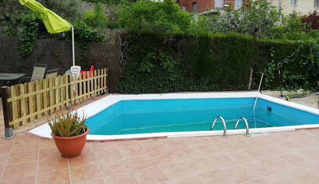 Chalet with mountain views and private pool, ideal for families.