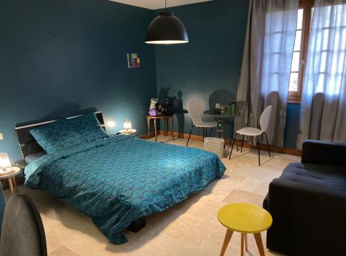 Chambre dans anciennes écuries