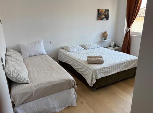 Chambre privée climatisé avec salle de bain partagée - Le Sable