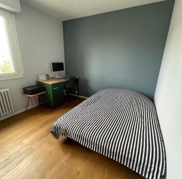 Chambre privée chez l'habitant avec accès à des espaces partagés