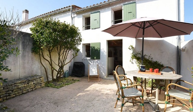 Charming Village House with Garden near Beach - 2BR, Modern Amenities, BBQ & Parking