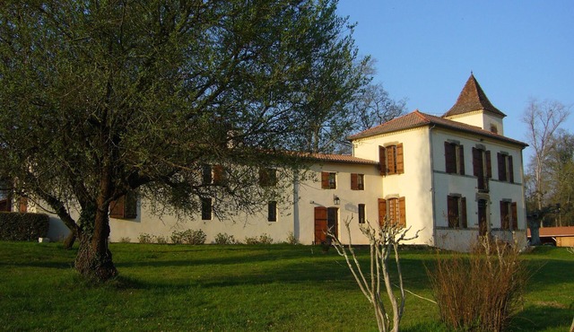 Character property in a wooded park with swimming pool