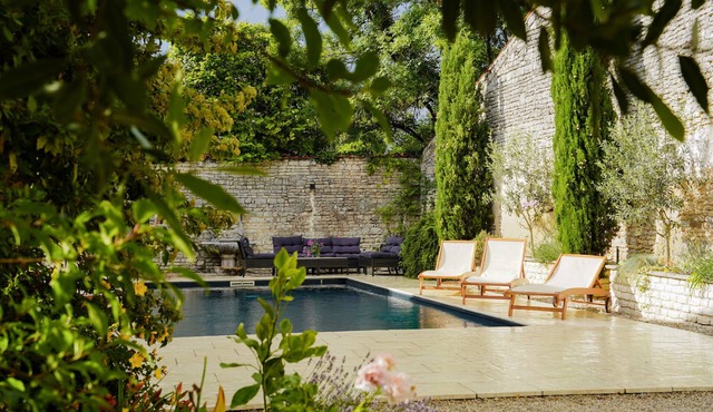 Character house with a pool in the middle of a historic village