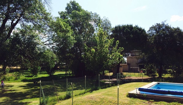 Character house in a farmhouse with landscaped above ground pool