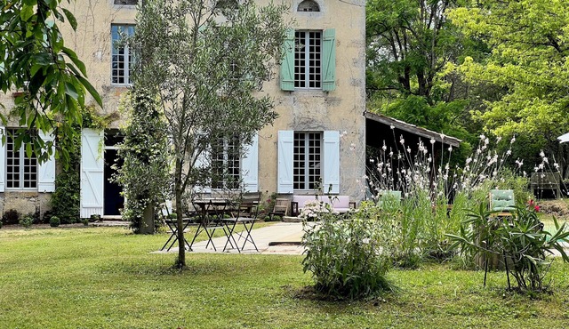 Character house located in lush greenery