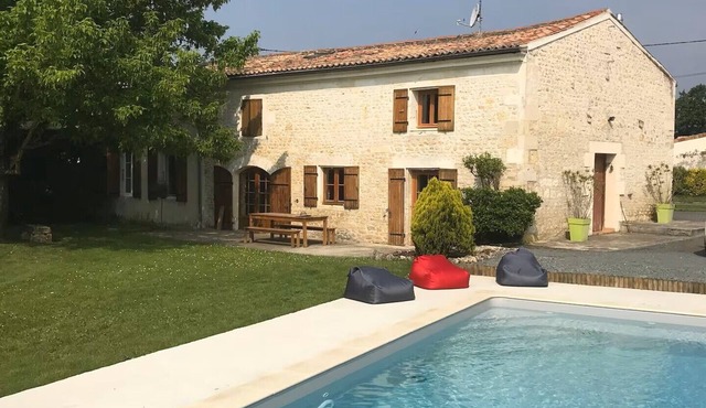 Charentais country house surrounded by vineyards with heated swimming pool