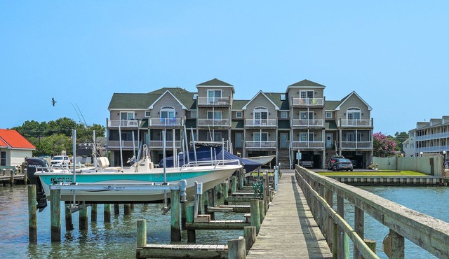 Charlie's Bayside Retreat | South Main Waterfront w/Private Boat Slip, Screened Porch & Pets