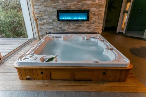 Charmante maison avec spa, sauna et jardin privatif