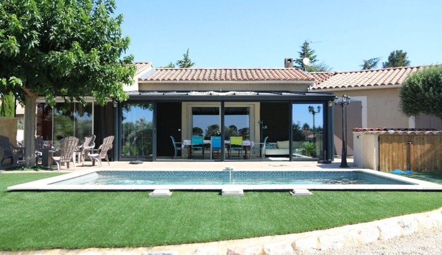 Charming spacious villa with veranda, swimming pool and view of organic vineyards & olive groves