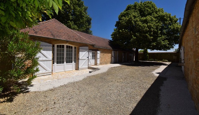 Charming stone house with shared, heated swimming pool and landscaped park