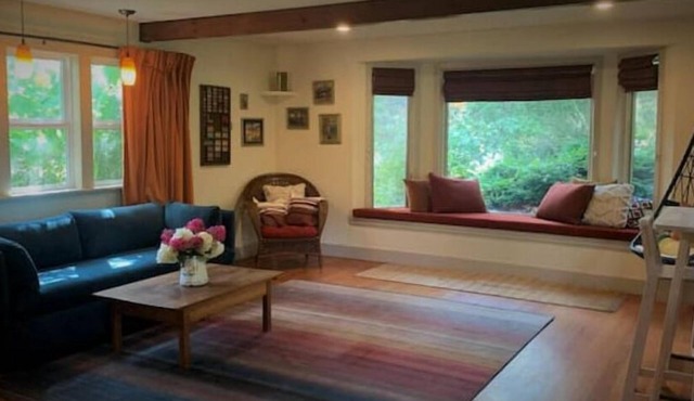 Charming 1-bedroom cottage in a peaceful garden setting.