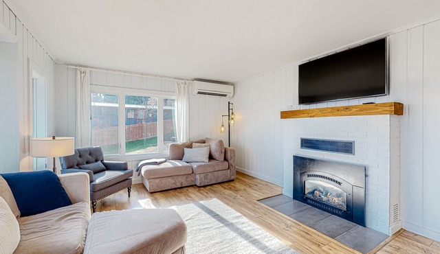 Charming 1940s abode with hot tub, grill, fireplace, & game room - beach access