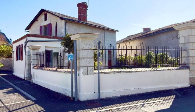 Charming 19th-Century Stone Cottage with Garden in Poitou