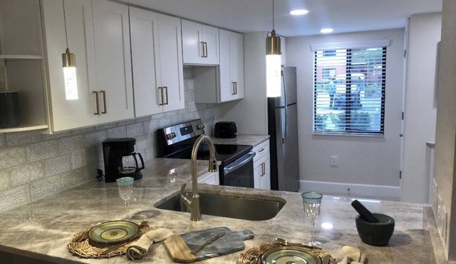 Charming 2-bedroom hotel with fitness room and AC in Kissimmee 1M from disney