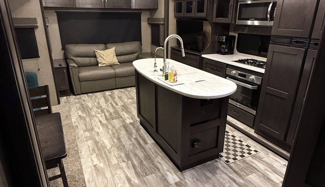 Charming 2-bedroom RV with AC and WiFi with outdoor living area