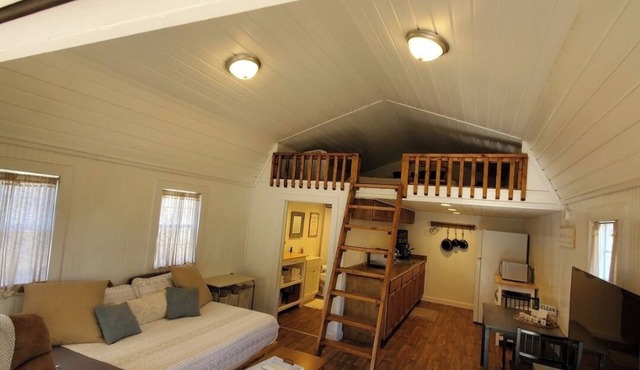 Charming 2-bedroom tiny house is a welcoming space for up to 4 guests and pups