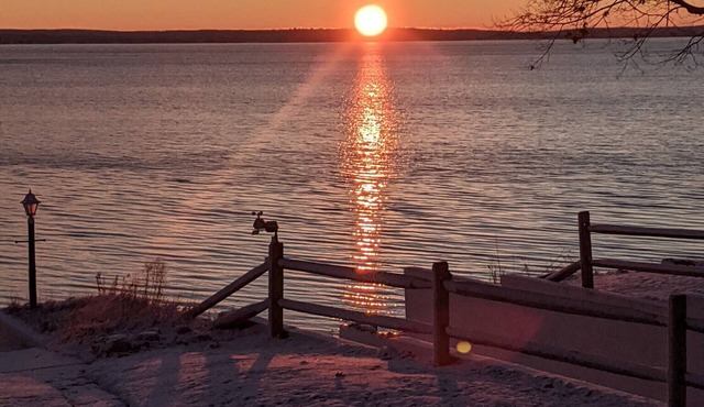 Charming 2-bedroom cabin sits on 2.5 acres on Hubbard Lake.