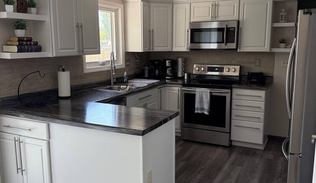 Charming 3 Bedroom 2.5 bathroom finished basement, Huge yard and Charcoal grill