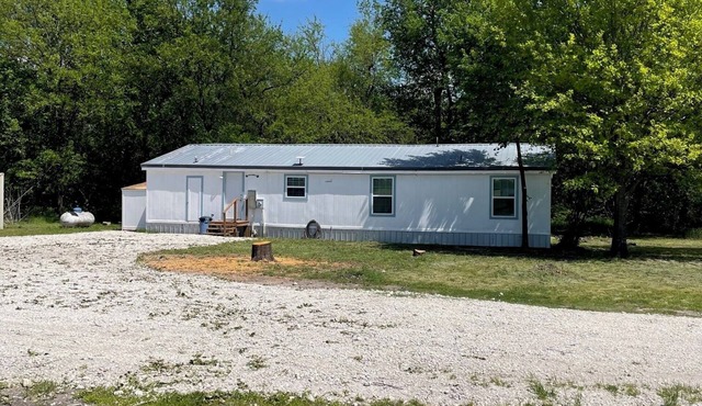 Charming 3-bedroom 2 Bath farmhouse on 7.4 Acres
