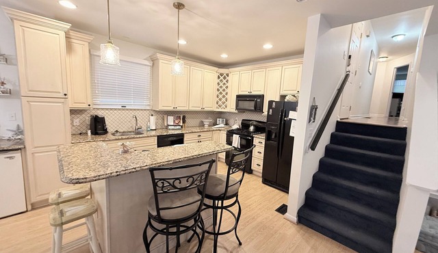 Charming 3-bedroom 2 bath , 1st floor condo on 23rd & Asbury