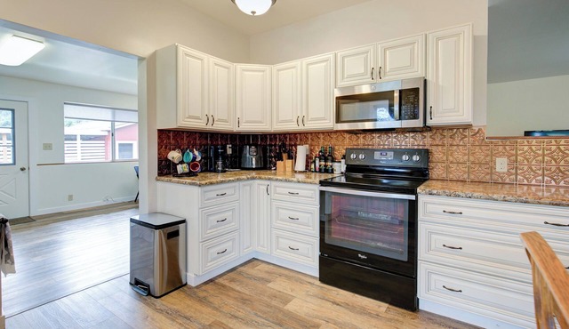 Charming 3-bedroom farmhouse on acreage.