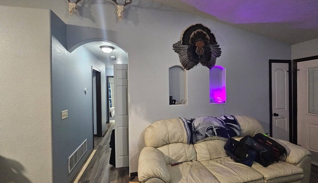 Charming 3-bedroom house with AC, WiFi, 2-car attached garage and fenced yard