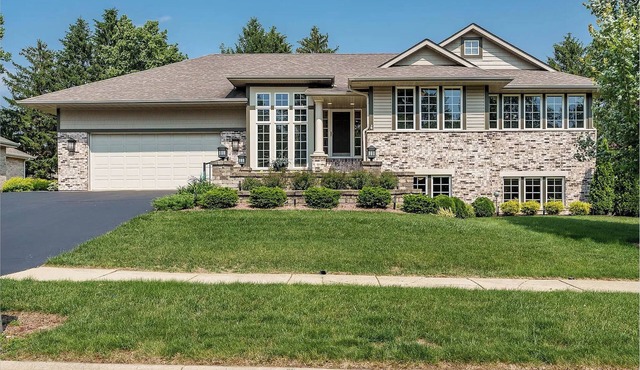 Charming 3-bedroom house with in home theater and gorgeous sunroom in Rockford.