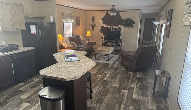 Charming 3-bedroom mobile home in a peaceful country setting.