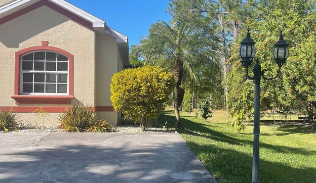 Charming 3-bedroom house in marvelous Lehigh Acres with Heated Pool and Jacuzzi