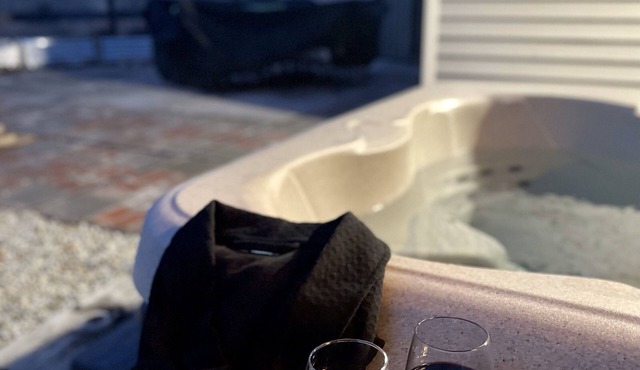 Charming 3-bedroom cabin in with AC, spa, game room, firepit & EV charger