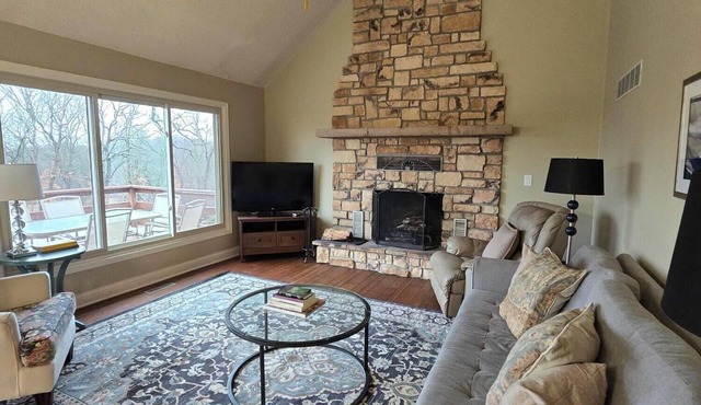 Charming 3-bedroom farmhouse with large front and back decks. Fenced in backyard