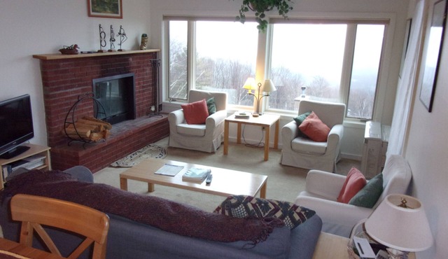 Charming 3-BR condo at Sugarbush with amazing views from two decks.