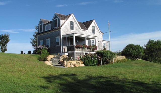 Charming 3BR Cottage Perched above the Sea Offers Spectacular Ocean Sunsets