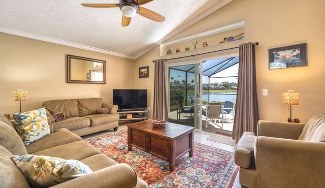 Charming 3BR home in Kissimmee with private pool and lake view, perfect for families.