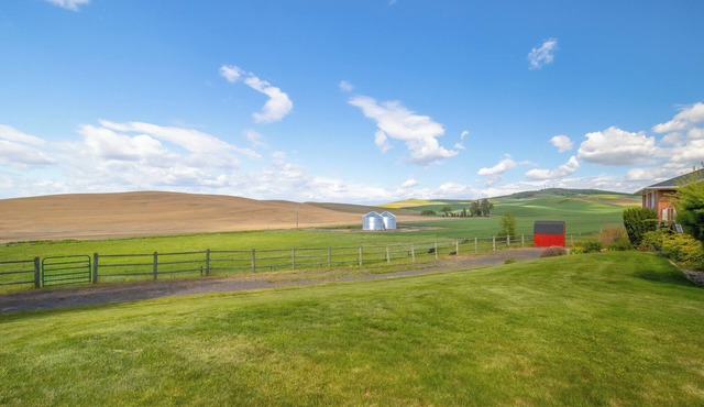 Charming 4 bedroom, 3 bathroom Brick Home located on 3 rural acres.