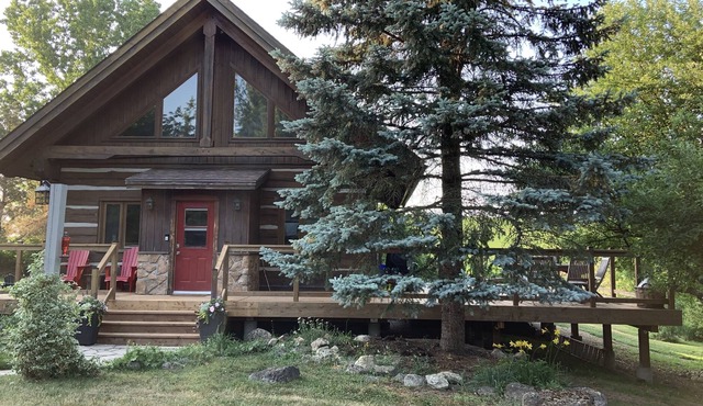 Charming 4 Bedroom Chalet located on a 1-acre lot w/hot tub.