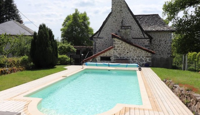 Charming 4-bedroom Cottage with Heated Pool, Sauna, and Garden in Scenic Cantal