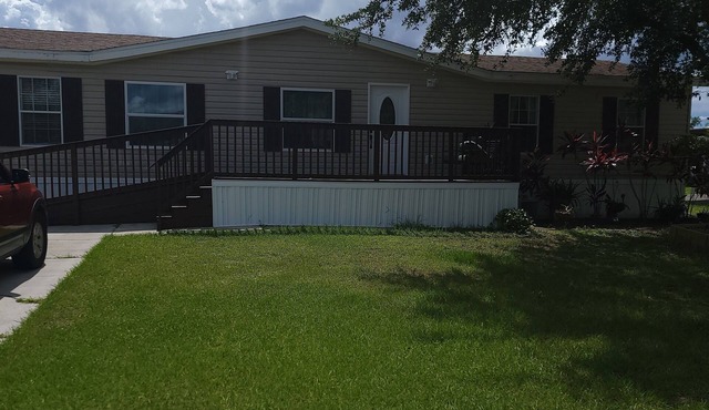 Charming 4-bedroom house with coffee/tea station WiFi and AC in Kissimmee