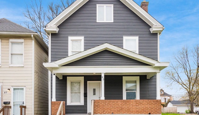 Charming 4-bedroom home with a pool table, spacious living, & modern kitchen.