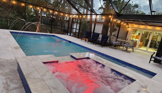 Charming 4-bedroom plus den villa with pool and spa near the beach and downtown.