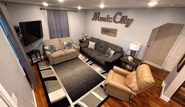 Charming 5BR 5BA home with driveway and yard near downtown!