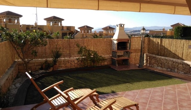 Charming and spacious ground floor apartment with own gardens and shared pool
